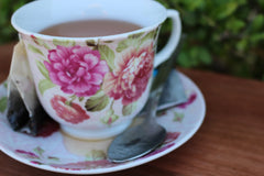 Cup of Tea on Saucer with Teaspoon